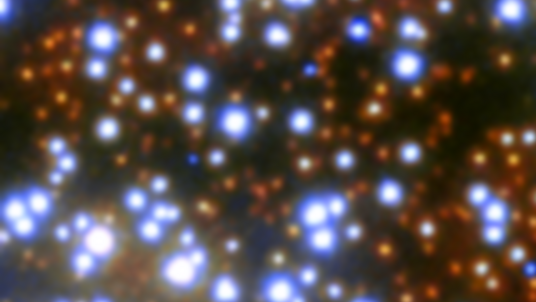 Viele helle Lichtpunkte auf dunklem Hintergrund mit kleinem schwarzem Kreis in der Mitte