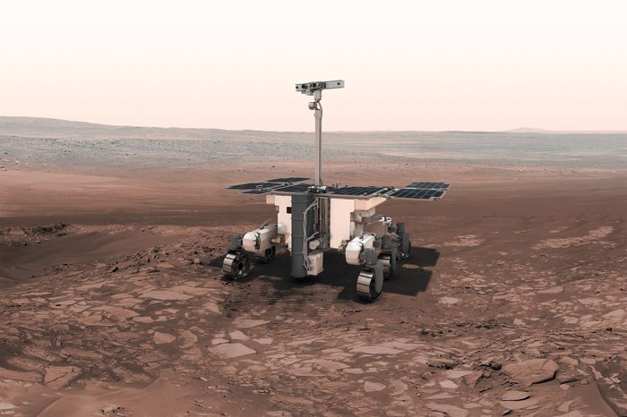 Künstlerische Darstellung des mit sechs Rädern und aufgeklappten Solarzellen ausgestatteten ExoMars Rover auf der Marsoberfläche