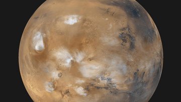 Ein rötlicher Planet im All