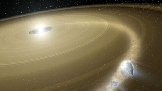 Um einen hellen Zentralstern ist Material in einer Scheibe angeordet. In der Scheibe fallen Planetentrümmer recht direkt auf den hellen Zentralstern.
