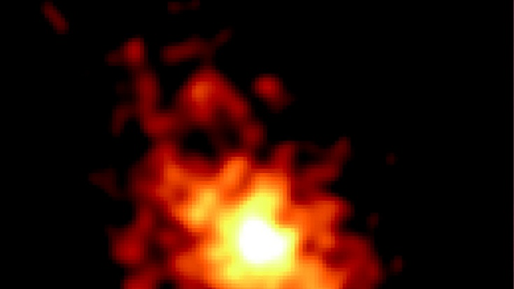 Ausgedehnte, diffuse Strahlungsquelle als helle Region vor einem schwarzen Hintergrund.