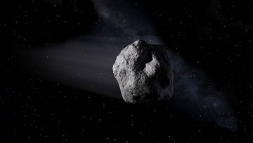 Dunkler Asteroid vor Sternenhintergrund