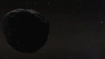 Ein dunkler, steiniger Himmelskörper im dunklen All