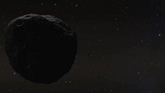 Ein dunkler, steiniger Himmelskörper im dunklen All