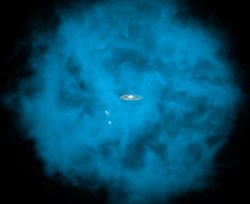 Große bläuliche Wolke, in deren Innern nur noch klein die Milchstraße als Spiralgalaxie zu erkennen ist. Schräg unter der Milchstraße, noch immer im mittleren Teil der Wolke, sind als undeutliiche Flecken die Magellanschen Wolken zu sehen.
