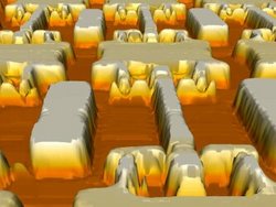 Computergrafik: Details eines Computerchips, die wie Felsen auf einem orangefarbenen Untergrund ruhen.
