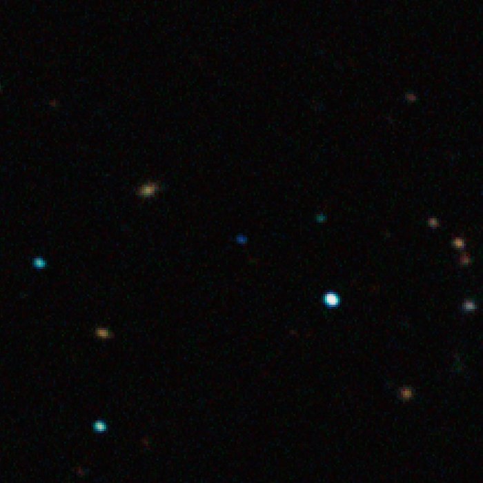 Planet ohne Sonne Der Planet erscheint als schwach leuchtender Punkt vor schwarzem Hintergrund.