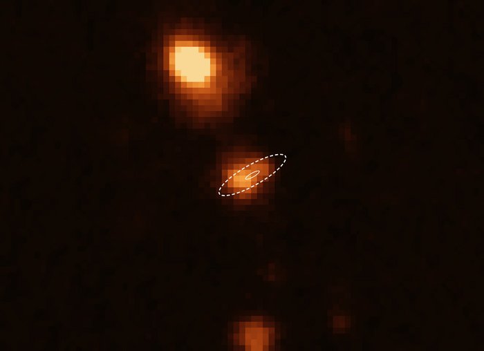 Aufnahme mit dem Very Large Telescope Die Herkunft eines FRB ist einer Aufnahme des VLT überlagert.