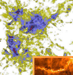 Unregelmäßiges Gebilde mit inneren Verdichtungen. Darin ein zweites Bild mit unregelmäßigen, filamentartige Strukturen