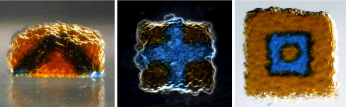 Formen aus Kugelhäufchen Drei Beispiele quadratischer Kugelhäufchen, in denen blaue und gelbe Bereiche dreidimensionale Muster bilden.