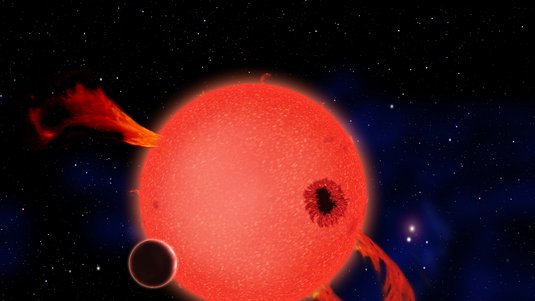 künstlerische Darstellung eines rötlichen Sterns