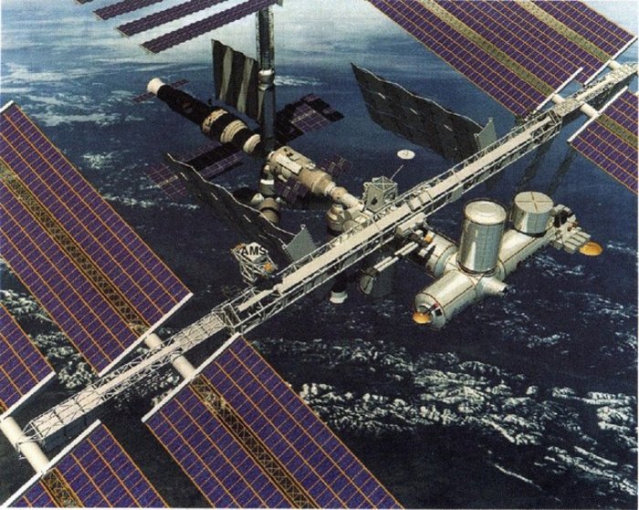 Das Alpha-Magnetische Spektrometer an der Raumstation ISS Fotomontage eines Modells der Raumstation ISS mit verschiedenen angedockten Modulen im All oberhalb der Erde