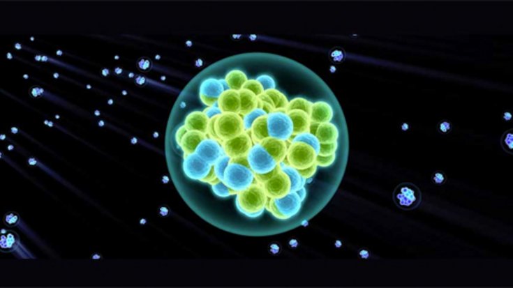 Grafische Darstellung eines superschweren Elements. Im Kern sind die Protonen und Neutronen als eng gepackte Kügelchen zu erkennen.