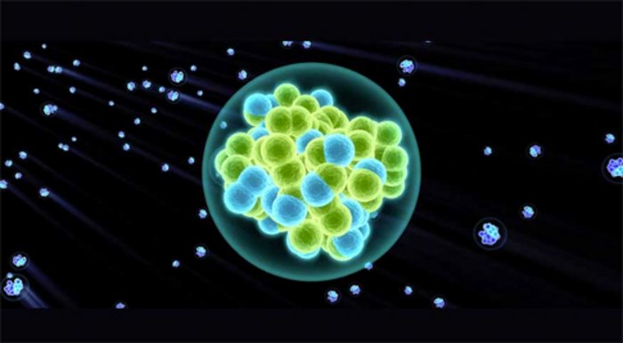 Grafische Darstellung eines superschweren Elements. Im Kern sind die Protonen und Neutronen als eng gepackte Kügelchen zu erkennen.