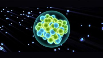 Grafische Darstellung eines superschweren Elements. Im Kern sind die Protonen und Neutronen als eng gepackte Kügelchen zu erkennen.