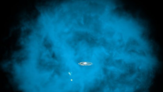 Die künstlerische Darstellung zeigt einen Halo aus heißem Gas, der sich mit einem Durchmesser von mindestens 600 000 Lichtjahren kugelförmig um das Milchstraßensystem herum erstreckt.
