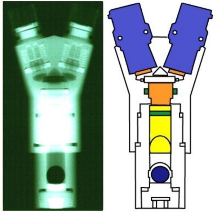 Neutronenradiographie und schematische Darstellung einer Ariane-Sprengkapsel >Neutronenradiographie einer Ariane-Sprengkapsel: Schwarz-Weiß-"Aufnahme" (Neutronenradiographie) des Innenlebens einer Sprengkapsel, daneben ist diesselbe Sprengkapsel schematisch dargestellt. Man sieht eine sehr gute Wiedergabe dess Innenlebens durch die neutronenradiographische Aufnahme.