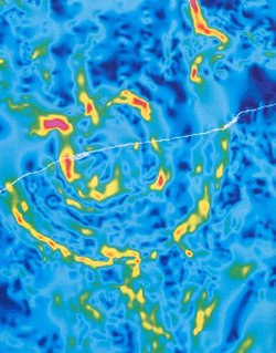 Darstellung der Schwerkraft über der Erdoberfläche in Falschfarben, es sind ringförmige Strukturen zu erkennen.