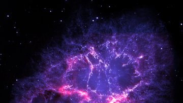 Unregelmäßige Gaswolke mit filamentartiger Struktur vor Sternenhintergrund