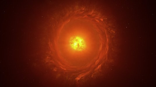 Leuchtender Kreis im Zentrum umgeben von einem schwächer leuchtenden Ring auf dunklem Hintergrund.