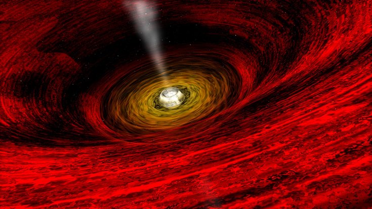Materie strömt in einer rotierenden Schweibe auf ein Schwarzes Loch im Zentrum. Von dort geht senkrecht zur Scheibe ein nach Materiestrahl aus.
