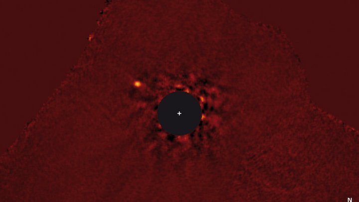 Optisch bearbeitete Teleskopaufnahme von Stern und Planet
