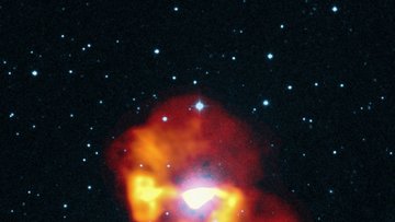 Große, rötliche Blasen um Schwarzes Loch