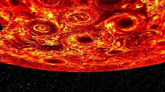 Am Südpol von Jupiter zeigen die Aufnahmen der Raumsonde Juno fünf Zyklonen um einen zentralen Wirbelsturm. 