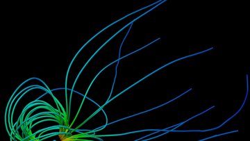 Der Schnappschuss aus der Simulation der Magnetfelder von Neptun zeigt eine kleinen Kugel in der Mitte, von der fadenartige Linien abgehen, teilweise in runden Schleifen wie Felder von einem Magneten.