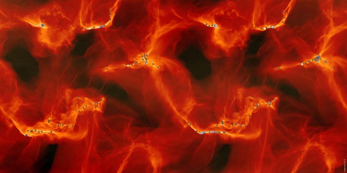 Sternenstehung einer Molekülwolke in einer Computersimulation In einer turbulenten Gaswolke zeigt die Stärke des roten Farbtones sowie Filamente aus Gas die Struktur und die Dichte der Gaswolke. Innerhalb der Wolke sind Punkte, die Orte der Sternentstehung markieren.