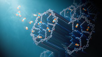 Illustration des neuen Materials: Hexagonale Röhren ragen in die Luft, auf die Gebilde von drei Kugeln - eine türkise und zwei orange jeweils an den Seiten, zufliegen