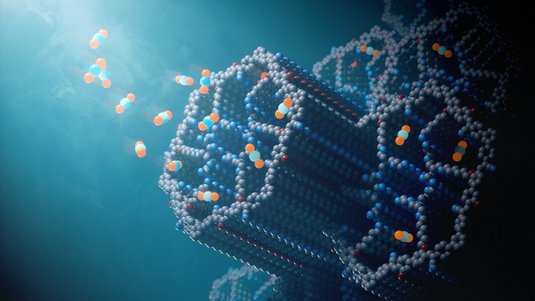 Illustration des neuen Materials: Hexagonale Röhren ragen in die Luft, auf die Gebilde von drei Kugeln - eine türkise und zwei orange jeweils an den Seiten, zufliegen