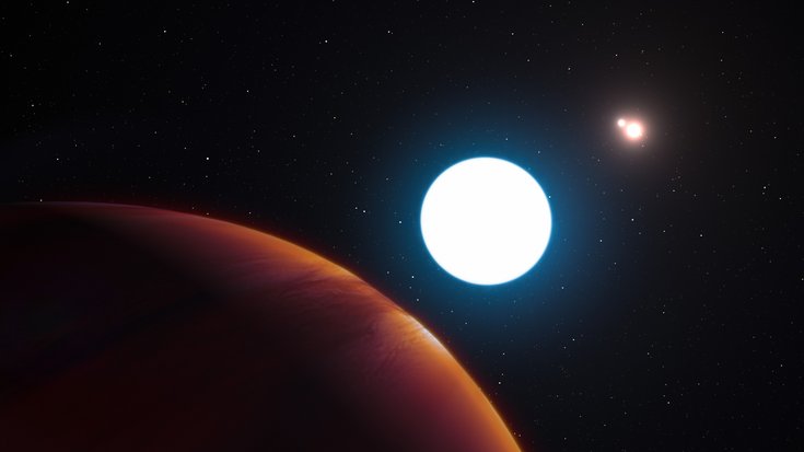 Im Zentrum ein großer Stern, links vorn ein Planet, rechts hinten zwei eng benachbarte kleinere Sterne.