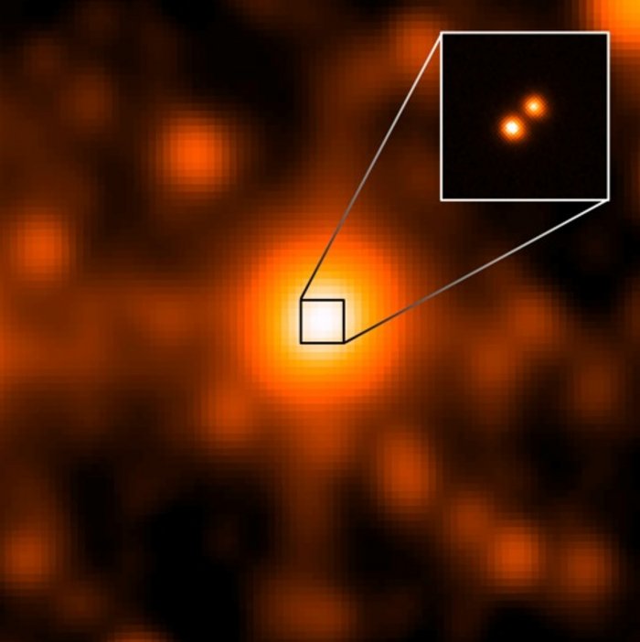 Das neue Doppelsternsystem Originalaufname des Gemini Observatoriums: Hellgelber Fleck mit Detailvergrößerung