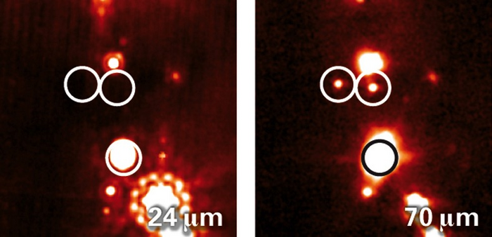 Protosterne leuchten im langwelligen Infrarotbereich Zwei Bilder zeigen denselben Ausschnitt des Orionnebels. Sie zeigen die empfangene Strahlung bei verschiedenen Wellenlängen. Im rechten Bild sind zwei Protosterne zusehen, sie strahlen bei 70 Mikrometern, im linken Bild sind sie unsichtbar, denn es zeigt Strahlung der Wellenlänge 24 Mikrometer.