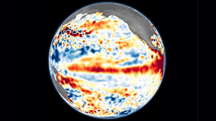 Oberflächentemperatur der Meere bei El Niño | Bildquelle: Lauren Dauphin using Copernicus Sentinel data (2023) processed by European Space Agency, Josh Willis, Severin Fournier, Kevin Marlis/NASA/JPL-Caltech Erde mit grauen Landmassen und verschieden farbigen Streifen auf der Meeresfläche
